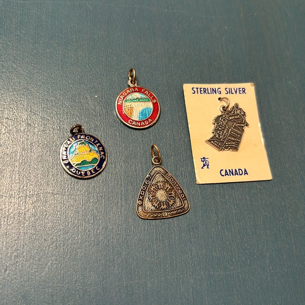4 Canadian Sterling Silver Charms